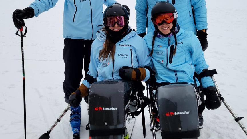 adaptive skiers break gates to